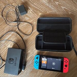 Nintendo Switch Handheld Console Blue Red Joy-Con with charger, port, case